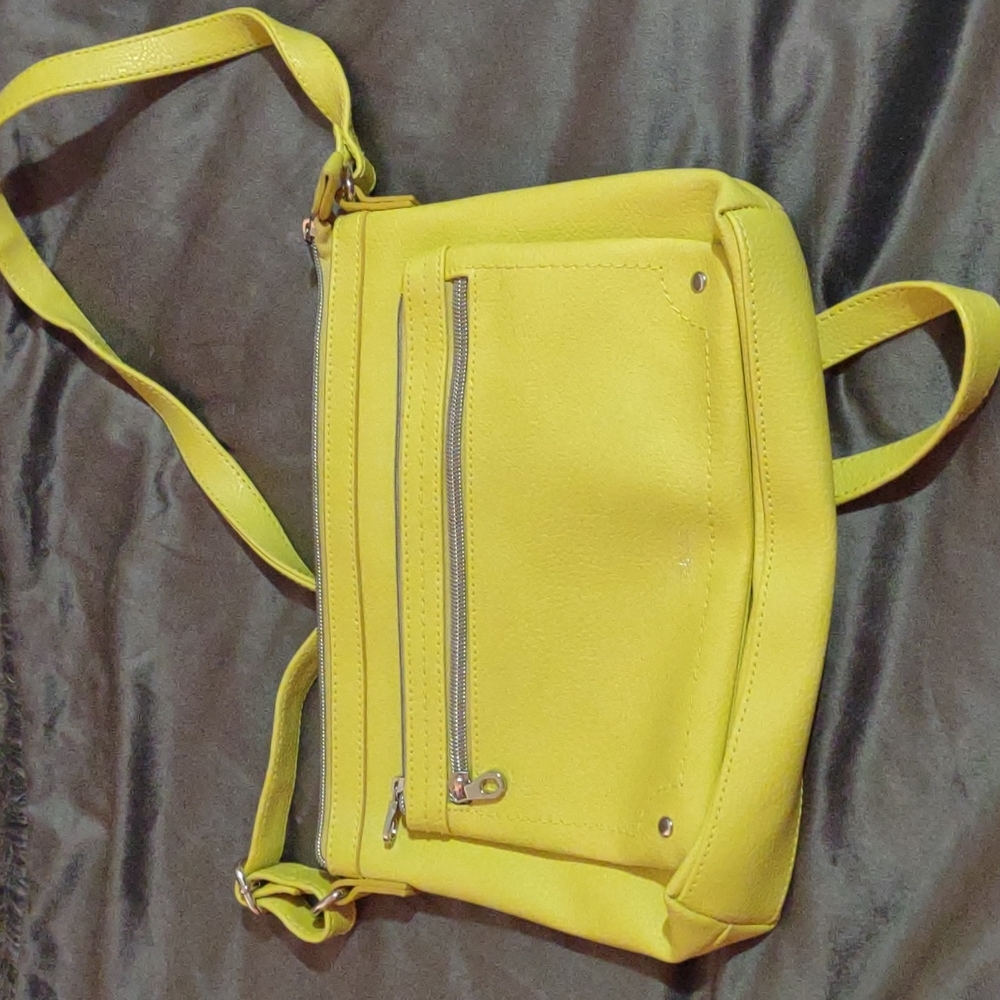 Bright yellow relic purse used once